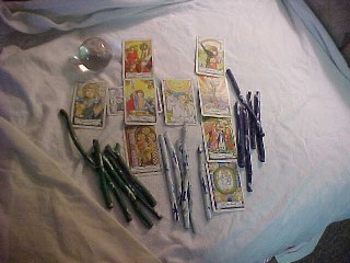 Tools used for Divination: Tarot Cards, Crystal Ball, Rune Sticks